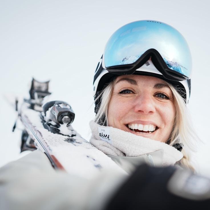 Kaveri Mehta, Lead Design Curator at CalmCraftStore, reviewing corporate floral arrangements